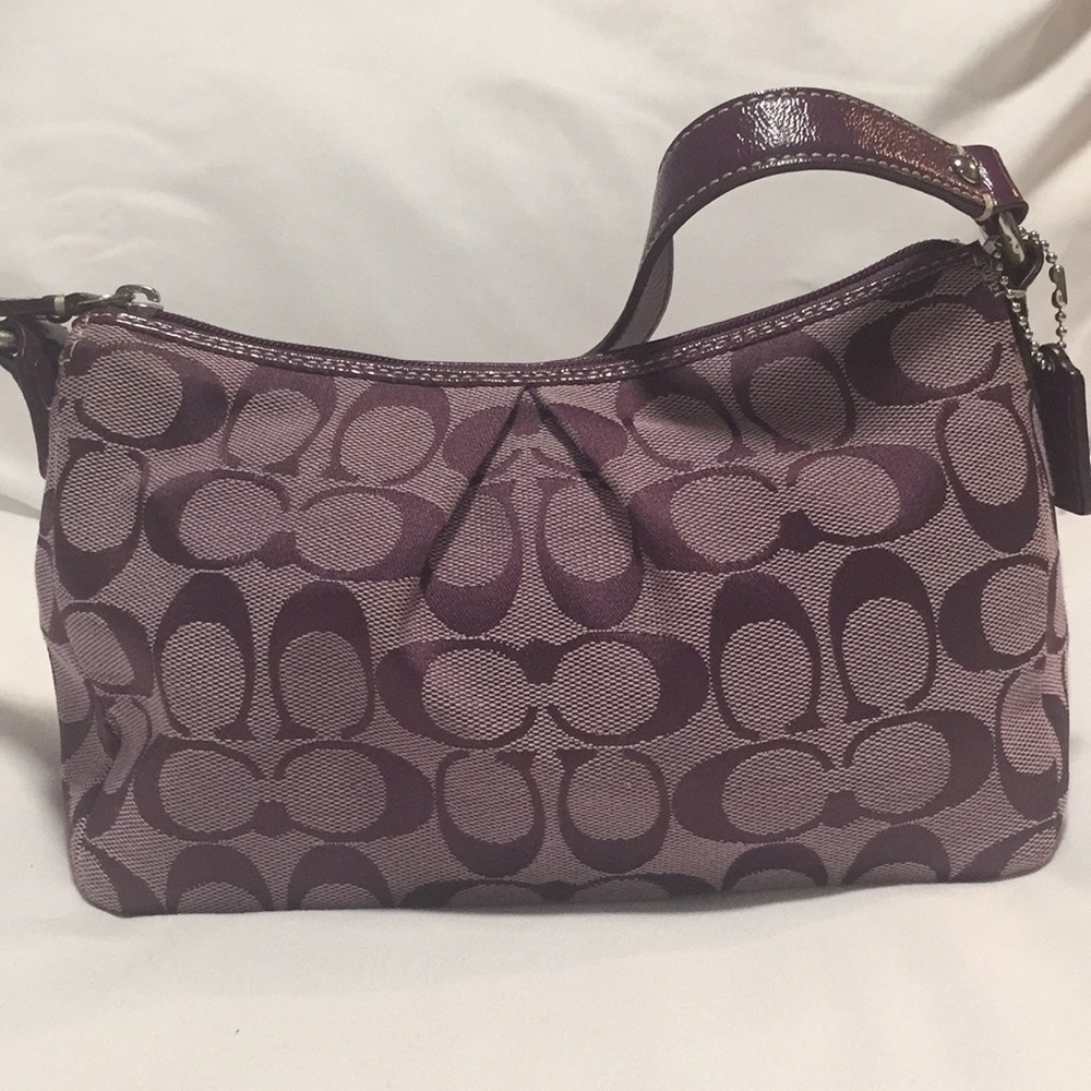 Small purple authentic coach purse